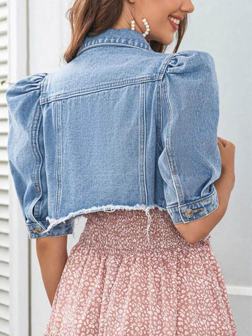 Jaqueta jeans rasgada