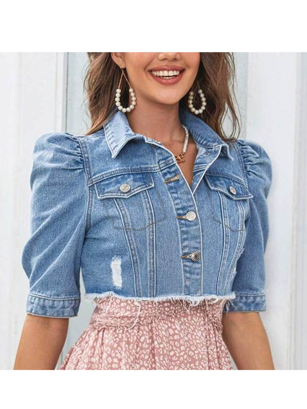 Jaqueta jeans rasgada